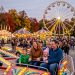 Families enjoying rides at the Doswell fairgrounds in fall