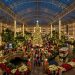 Families walking through glowing ice sculptures inside the ICE! attraction at Gaylord Opryland Resort during the 2026 Christmas season
