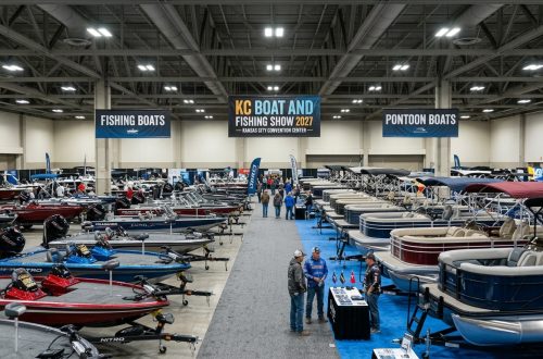 Rows of fishing and pontoon boats on display at the KC Boat and Fishing Show 2027 inside Kansas City Convention Center