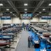 Rows of fishing and pontoon boats on display at the KC Boat and Fishing Show 2027 inside Kansas City Convention Center